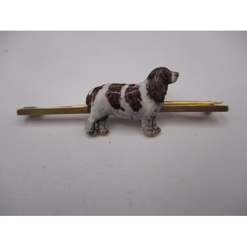 80 - A vintage 15ct gold and enamel bar brooch, having a spaniel in naturalistic coloured enamel, approx.... 