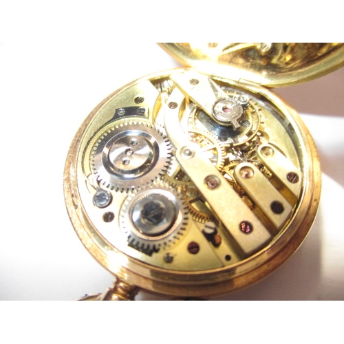 133 - A vintage 15ct gold cased half hunter pocket watch, runs when wound, having general use-related mark... 