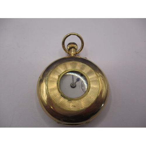 133 - A vintage 15ct gold cased half hunter pocket watch, runs when wound, having general use-related mark... 