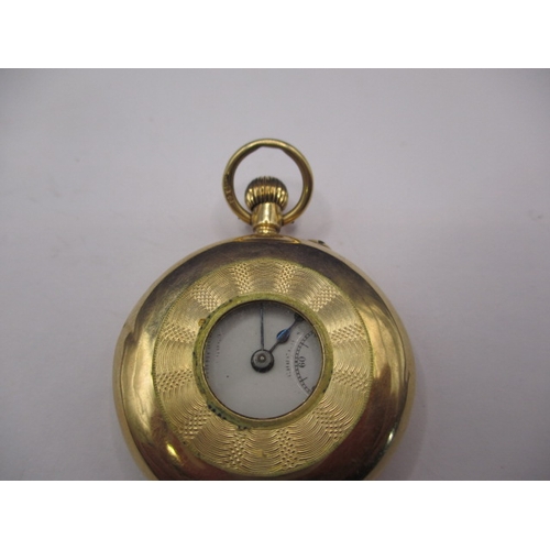 133 - A vintage 15ct gold cased half hunter pocket watch, runs when wound, having general use-related mark... 