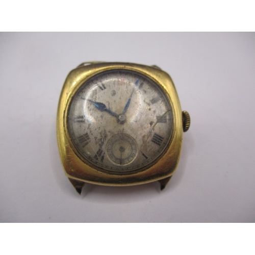 134 - A 1930s 18ct gold cased wrist watch, in well used condition, still runs when wound, no strap and gen... 