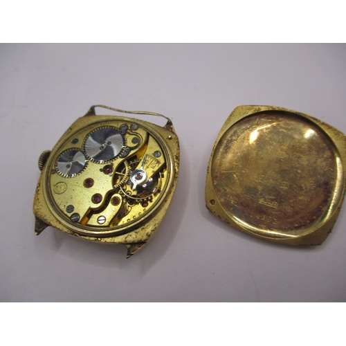 134 - A 1930s 18ct gold cased wrist watch, in well used condition, still runs when wound, no strap and gen... 