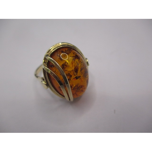 3 - A vintage 9ct yellow gold ring with a natural amber cabochon, approx. ring size ‘P+’, approx. weight... 