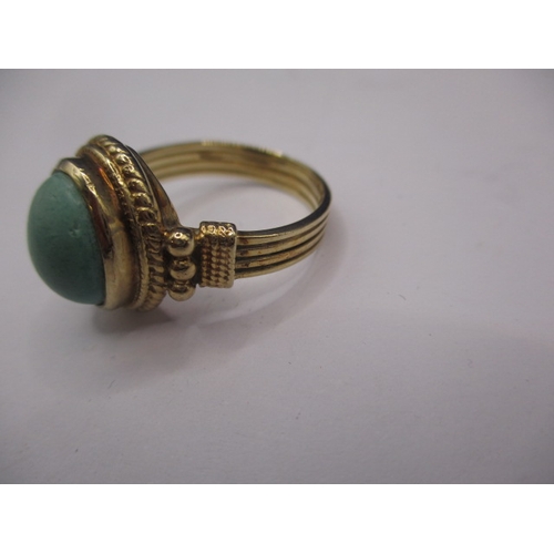 2 - A 9ct yellow gold dress ring with matt green turquoise cabochon stone, approx. ring size ‘O’, approx... 