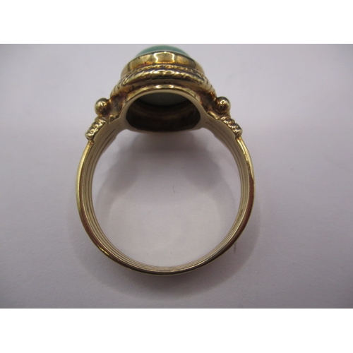 2 - A 9ct yellow gold dress ring with matt green turquoise cabochon stone, approx. ring size ‘O’, approx... 