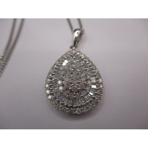 86 - A 9ct white gold necklace and pendant, the pendant set with over 100 small diamonds, approx. parcel ... 