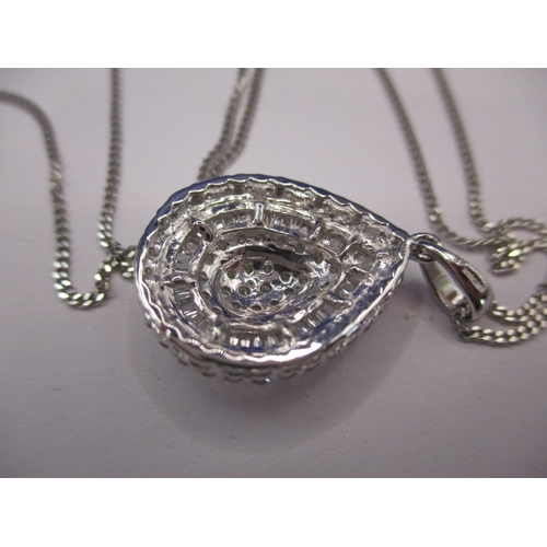 86 - A 9ct white gold necklace and pendant, the pendant set with over 100 small diamonds, approx. parcel ... 