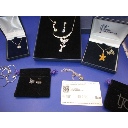A small parcel of costume jewellery to include silver and diamonds, all in used condition