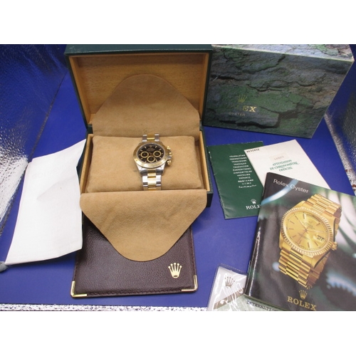 137 - A 1995 Rolex Daytona oyster perpetual chronometer, with original box and paperwork, having Zenith mo... 