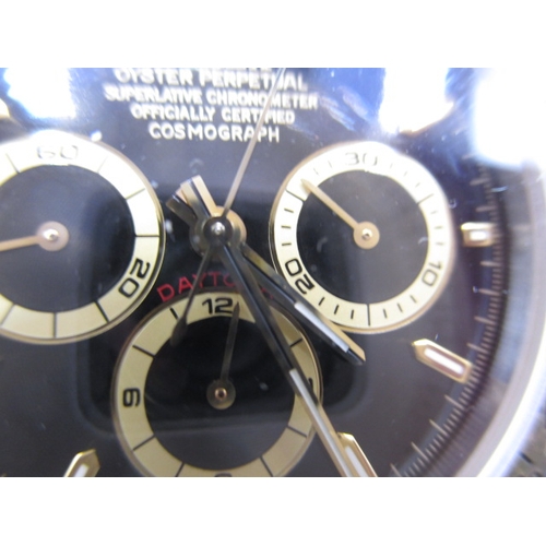 137 - A 1995 Rolex Daytona oyster perpetual chronometer, with original box and paperwork, having Zenith mo... 