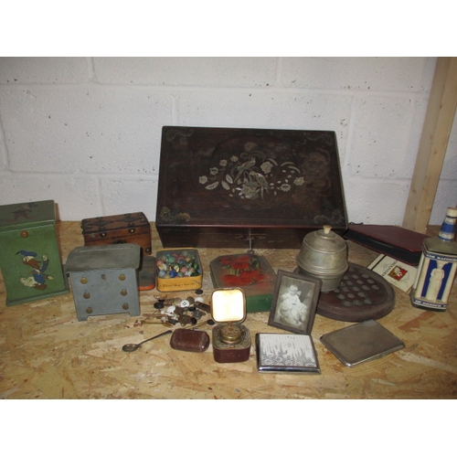 348 - A vintage inlaid box with contents of interesting collectables, to include a Disney money box, some ... 