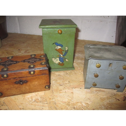 348 - A vintage inlaid box with contents of interesting collectables, to include a Disney money box, some ... 