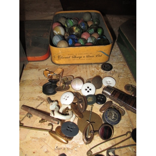 348 - A vintage inlaid box with contents of interesting collectables, to include a Disney money box, some ... 