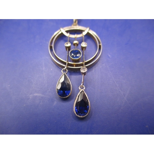 96 - An unmarked gold and possibly platinum art deco diamond and sapphire necklace pendant, in good pre-o... 