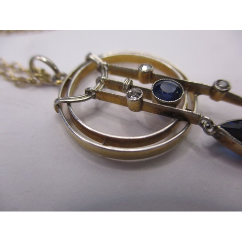 96 - An unmarked gold and possibly platinum art deco diamond and sapphire necklace pendant, in good pre-o... 