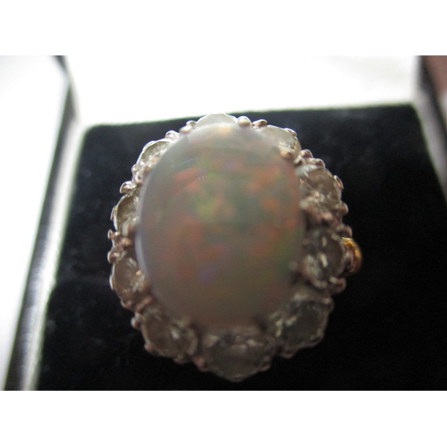 18 - An 18ct yellow gold diamond and opal ring, approx. ring size ‘K’ approx. weight 5.7g , approx. size ... 