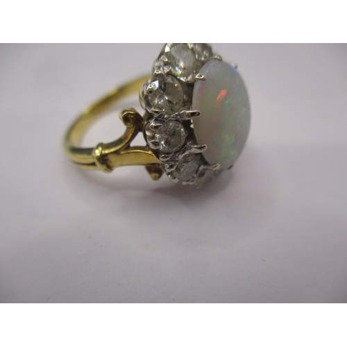 18 - An 18ct yellow gold diamond and opal ring, approx. ring size ‘K’ approx. weight 5.7g , approx. size ... 