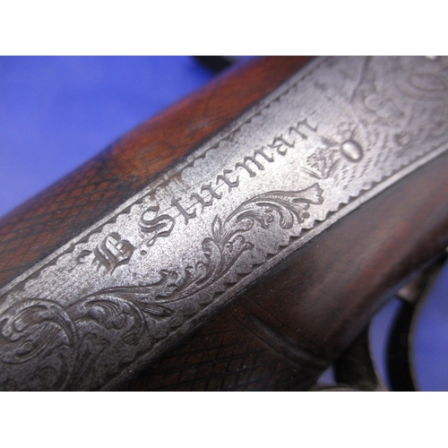 284 - A 19th century percussion muzzle loading double barrel shot gun by B Sturman, London. Having Damascu... 