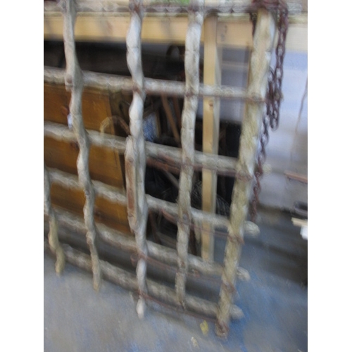 323 - An antique Eastern European Romany caravan front axle case, having been stripped to bare wood and us... 