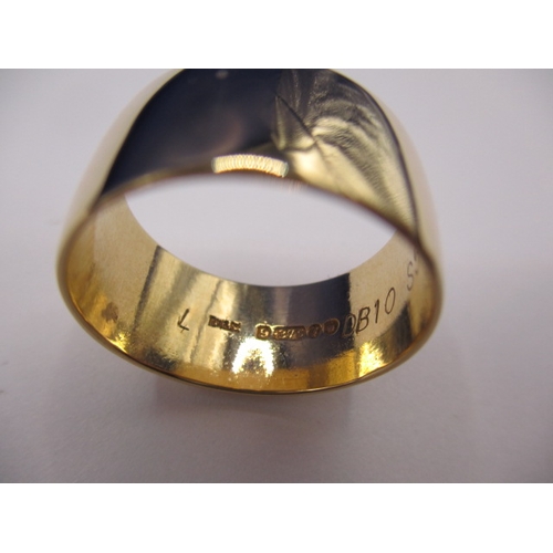 57 - A 9ct yellow gold wedding band, approx. ring size ‘P’ approx. width 10mm, approx. weight 5.5g, in go... 