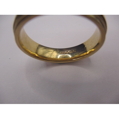 59 - A 9ct yellow gold wedding band with bead decoration, approx. ring size ‘U’, approx. width 6mm, appro... 