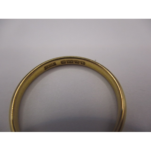 60 - A 22ct yellow gold wedding band, approx. ring size ‘M’, approx. width 2.5mm, approx. weight 1.9g in ... 