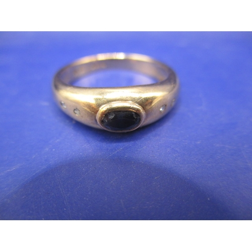 24 - A vintage 9ct yellow gold ring with central dark blue sapphire flanked 2 small diamonds each side, a... 