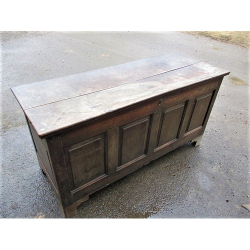 307 - An 18th century oak coffer with removable zinc rodent proof liner, having replacement bracket feet a... 