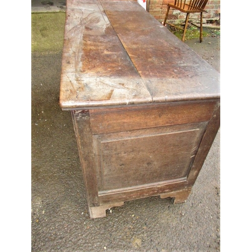 307 - An 18th century oak coffer with removable zinc rodent proof liner, having replacement bracket feet a... 