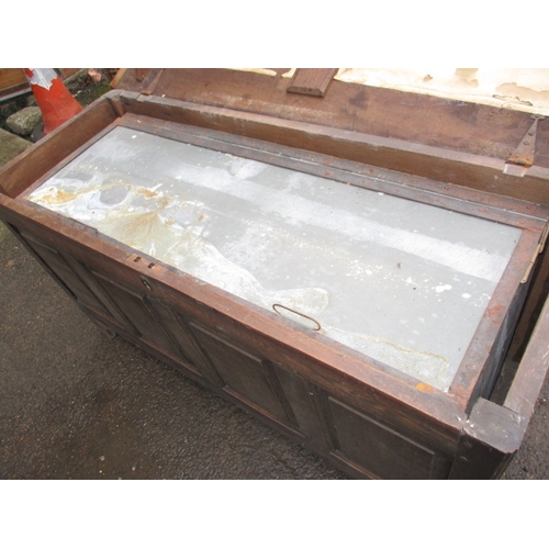 307 - An 18th century oak coffer with removable zinc rodent proof liner, having replacement bracket feet a... 