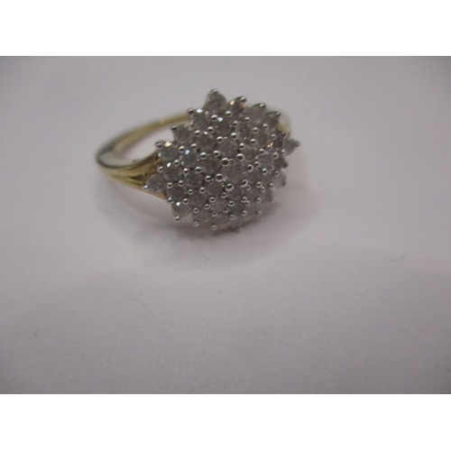 28 - A 9ct yellow gold cluster ring, set with diamonds, approx. ring size ‘O’, approx. weight 3g in good ... 