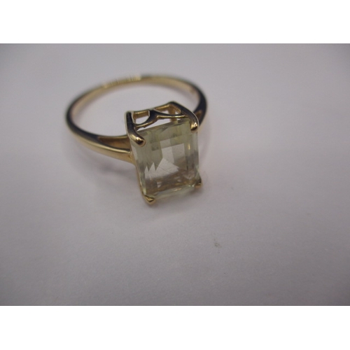 31 - A 9ct yellow gold dress ring with large pale lemon Serenite stone, approx. ring size ‘P+’, approx. w... 