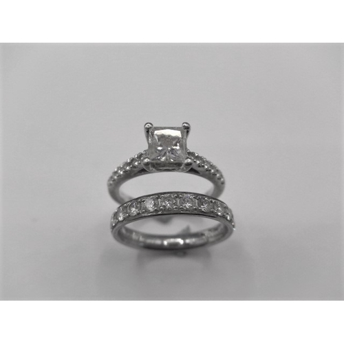 64 - A pair of 950 platinum and diamond rings, both approx. ring size of ‘J’ the central square cut stone... 