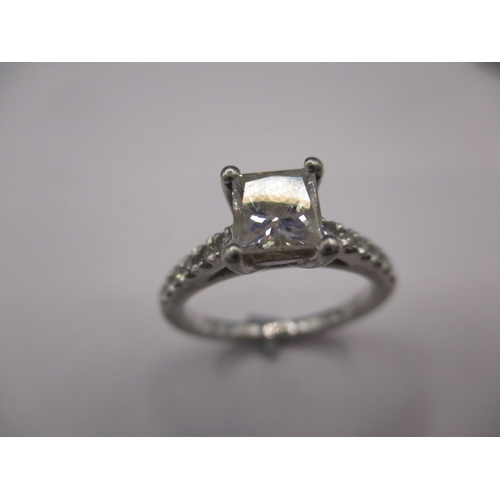 64 - A pair of 950 platinum and diamond rings, both approx. ring size of ‘J’ the central square cut stone... 