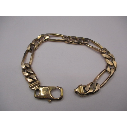 102 - A 9ct yellow gold solid flat curb and paperclip link bracelet, in good used condition with working c... 