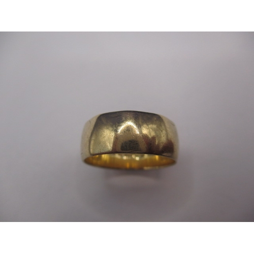 66 - A vintage 9ct yellow gold wedding band, approx. ring size ‘M’ approx. width 7.1mm, approx. weight 3.... 