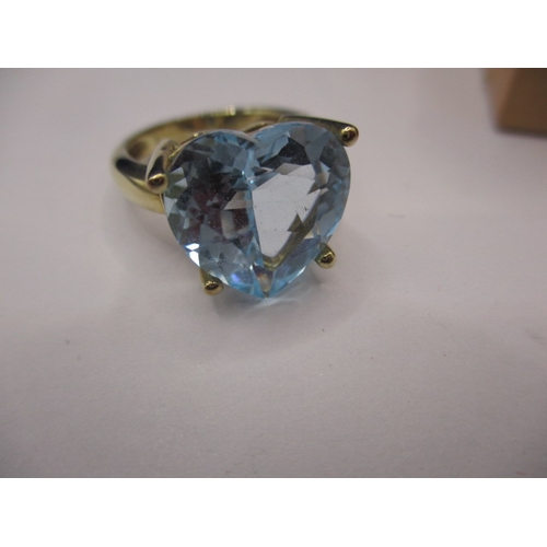 33 - A 9ct yellow gold dress ring, with a large heart shape topaz? Stone, approx. ring size ‘L+’, in good... 