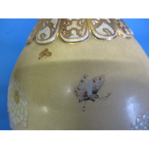 358 - A 19th century Japanese tube-lined decorated vase, approx. height 42cm, having two small chips to fo... 