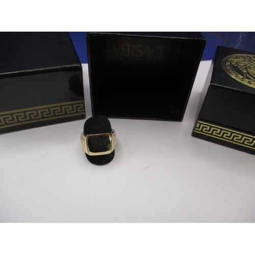 70 - A Versace 18ct yellow gold signet ring, approx. ring size ‘X’, approx. weight 16.6g, in pre-owned ne... 