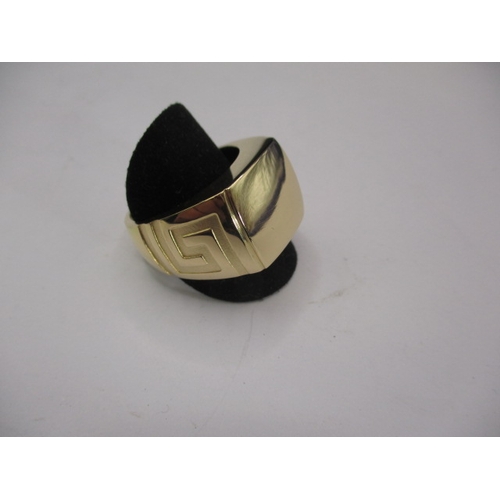 70 - A Versace 18ct yellow gold signet ring, approx. ring size ‘X’, approx. weight 16.6g, in pre-owned ne... 