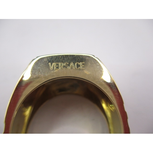 70 - A Versace 18ct yellow gold signet ring, approx. ring size ‘X’, approx. weight 16.6g, in pre-owned ne... 