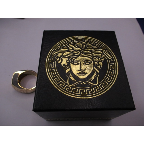 70 - A Versace 18ct yellow gold signet ring, approx. ring size ‘X’, approx. weight 16.6g, in pre-owned ne... 