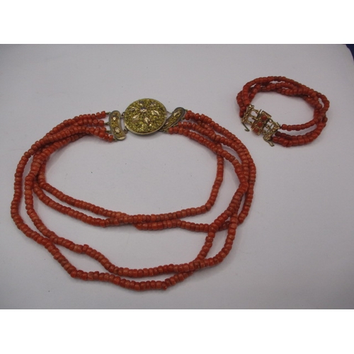 127 - A rose coral necklace and bracelet with 18ct yellow gold mounts, approx. lengths 34 & 16cm, both in ... 