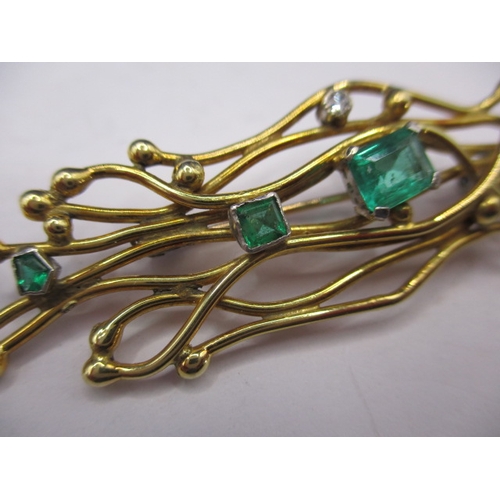 114 - An antique 18ct gold brooch set with diamonds and emeralds, approx. width 6cm approx. weight 10.5g