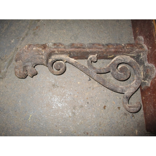 361 - A parcel of Victorian iron tack racks, to include a dog mask saddle rack which has boron fixing brok... 