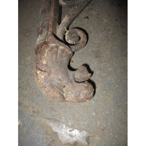 361 - A parcel of Victorian iron tack racks, to include a dog mask saddle rack which has boron fixing brok... 