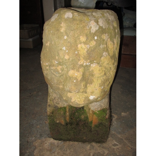 327 - A medieval carved stone head, approx. height 60cm, family legend relates to this being removed in th... 