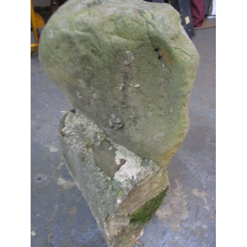 327 - A medieval carved stone head, approx. height 60cm, family legend relates to this being removed in th... 