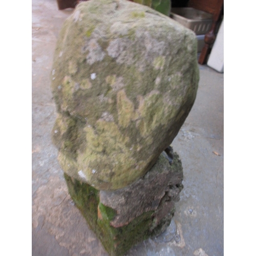 327 - A medieval carved stone head, approx. height 60cm, family legend relates to this being removed in th... 