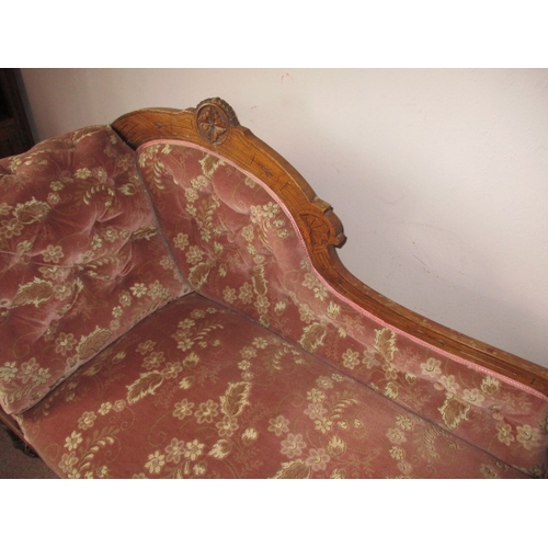 330 - A late 19th century day bed with carved walnut frame and red upholstery, in good used condition. App... 